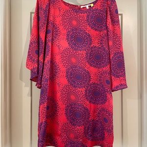 Collective Concepts will tunic like dress-red and purple print